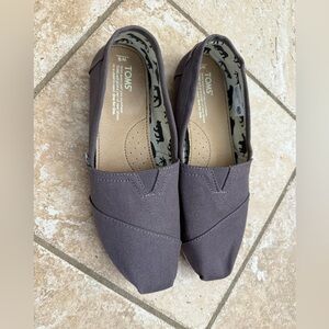 TOMS Gray Canvas Slip-Ons with Patterned Lining